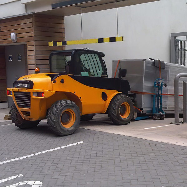 Specialist forklift lifting used to position heavy equipment safely